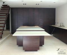 Bespoke Smokey Walnut Veneered Kitchen with Caesar Stone Worktops.